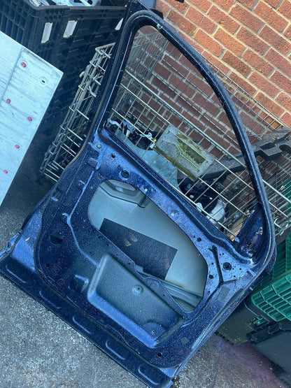 LAND ROVER DISCOVERY PASSENGER SIDE BLUE FRONT DOOR