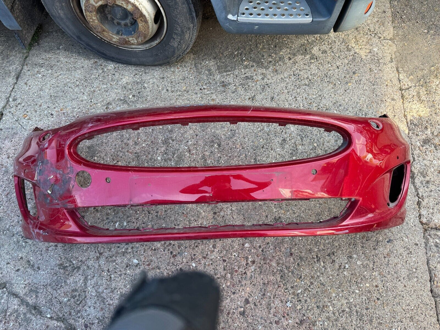 Genuine Jaguar XKR front bumper PDC holes - P/N BW83-17C831-ACW DAMAGED