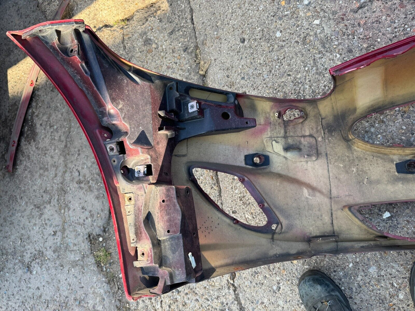 Genuine Jaguar XKR front bumper PDC holes - P/N BW83-17C831-ACW DAMAGED