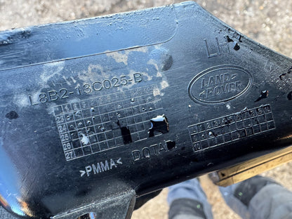 2025 Land Rover Defender L663 Front Left Headlamp Surround L8B2-13C025 scratched