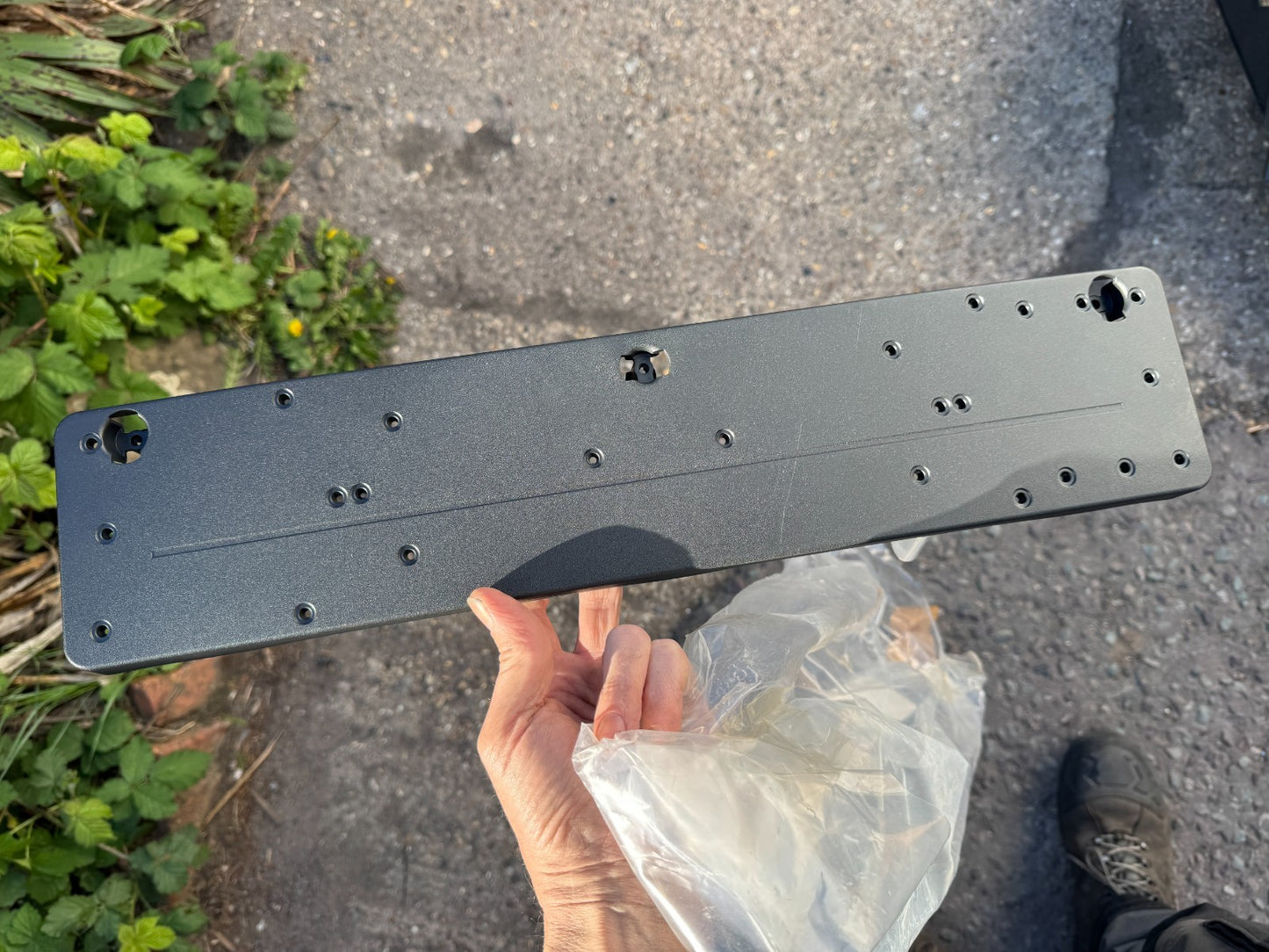 Licence plate holder Mercedes a2438855003 New but has a scratch