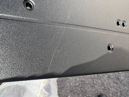 Licence plate holder Mercedes a2438855003 New but has a scratch
