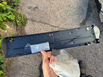 Licence plate holder Mercedes a2438855003 New but has a scratch