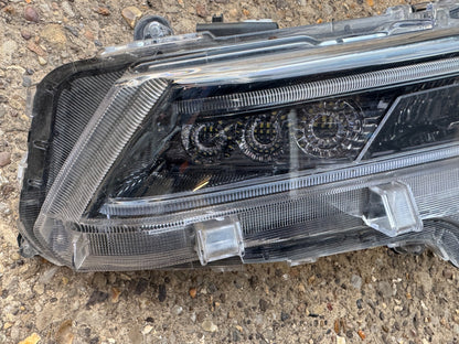 TOYOTA COROLLA E21 LEFT SIDE HEADLIGHT  GENUINE 81150-02T00 DAMAGED