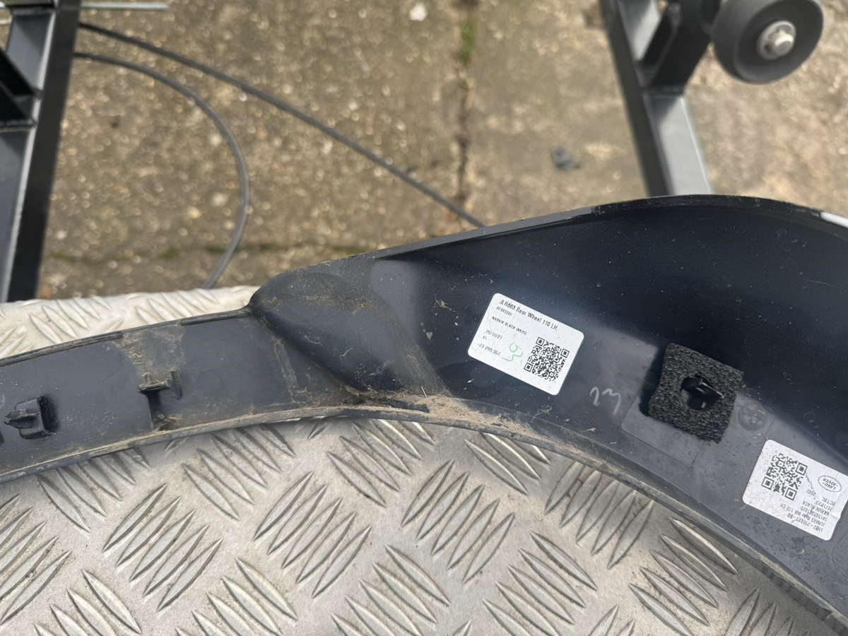 GENUINE LAND ROVER DEFENDER L663 REAR LEFT WHEEL ARCH TRIM L8B2-290E23-BB