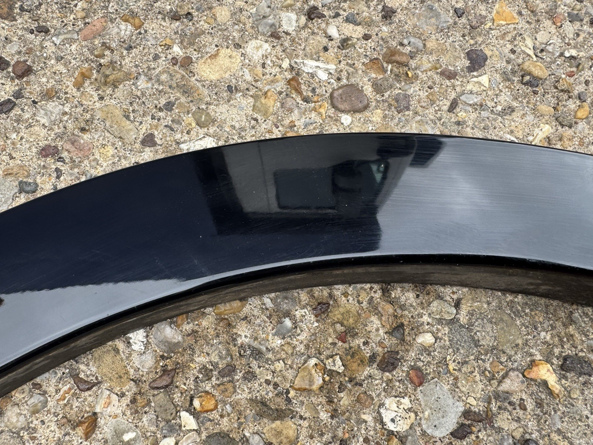 Defender L663 near Wheel Arch Trim, front left hand side L8B2-16A075-BX