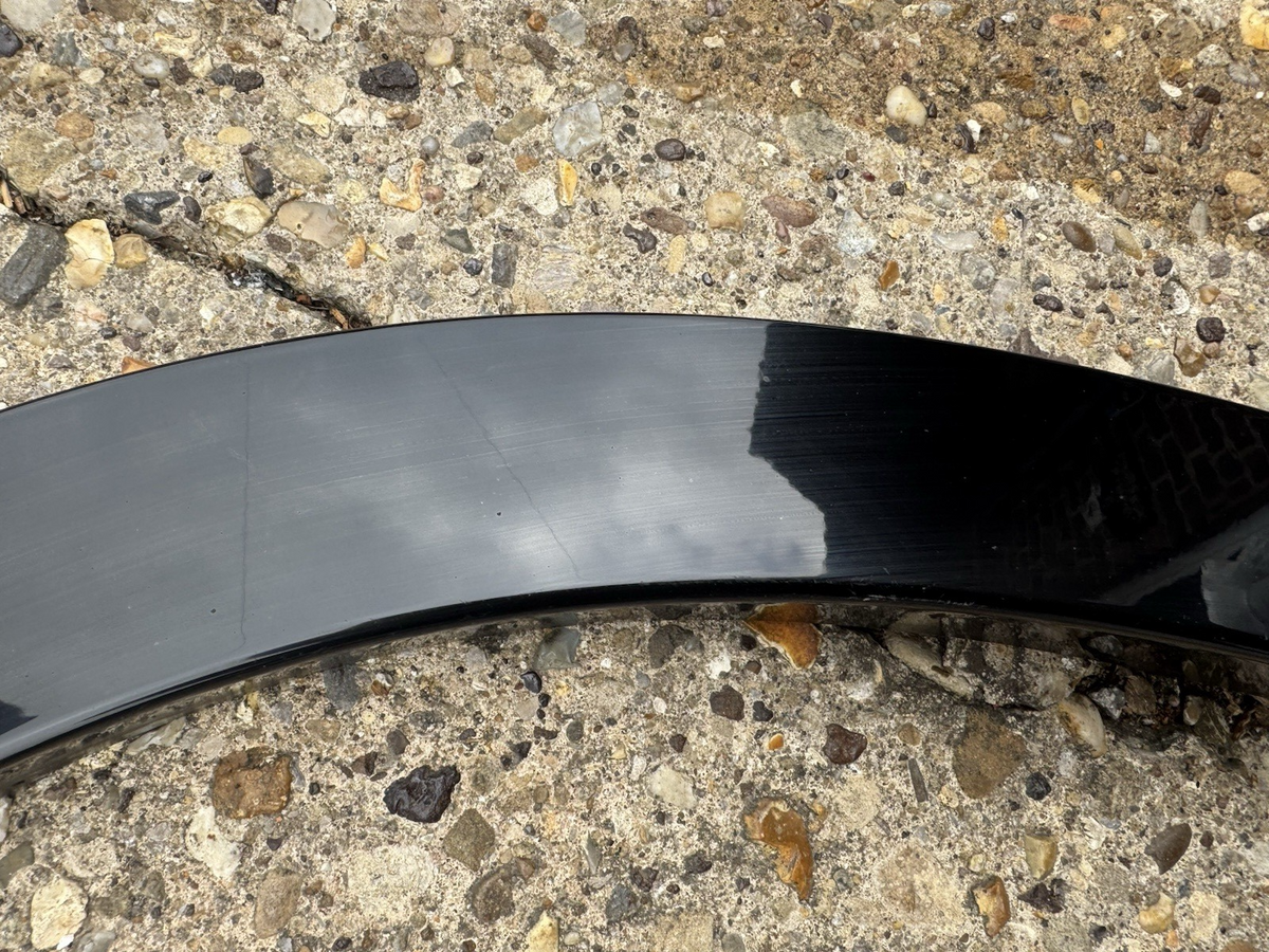 Defender L663 near Wheel Arch Trim, front left hand side L8B2-16A075-BX