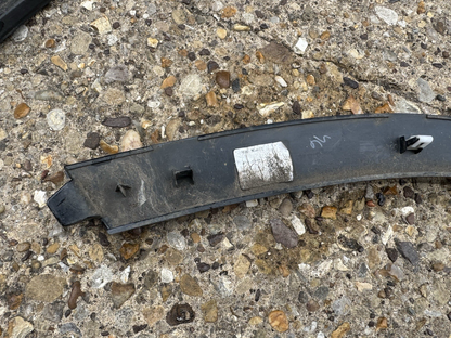 Defender L663 near Wheel Arch Trim, front left hand side L8B2-16A075-BX